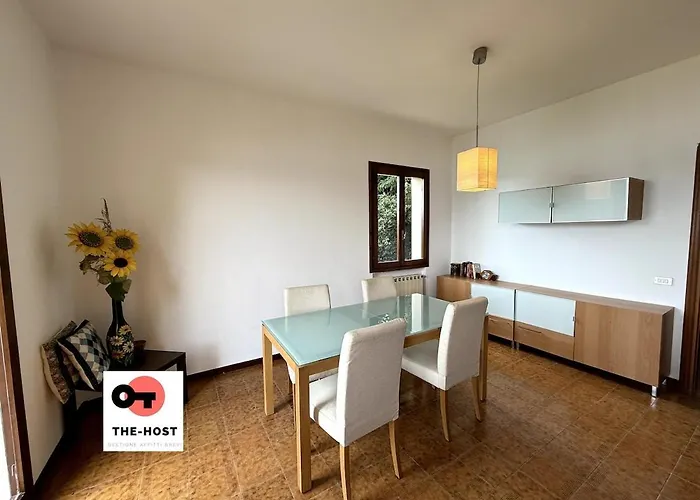 Between Greenery And The Lake, A In