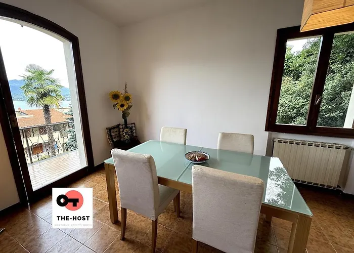 Between Greenery And The Lake, A In